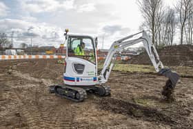 The Volvo electric excavator on site at Holdingham Roundabout. EMN-210706-144444001