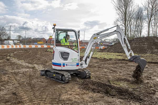 The Volvo electric excavator on site at Holdingham Roundabout. EMN-210706-144444001