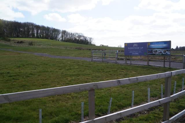 The site of the proposed development, with Hamilton Hill in the background. EMN-210528-131946001