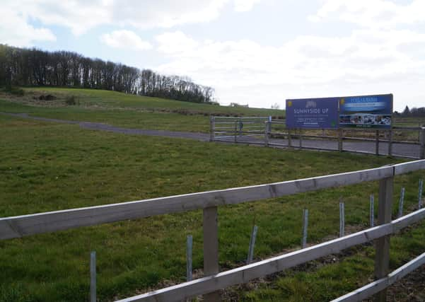 The site of the proposed development, with Hamilton Hill in the background. EMN-210528-131946001