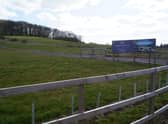 The site of the proposed development, with Hamilton Hill in the background. EMN-210528-131946001
