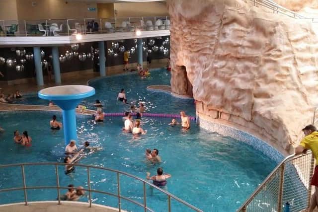 Lifeguard tried to resuscitate the mum after she was pulled from the pool.