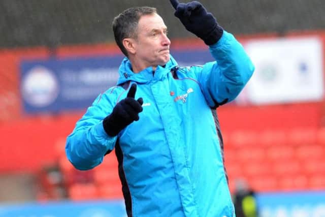 United assistant John McDermott.