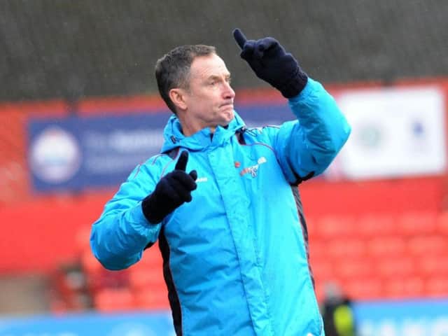 United assistant John McDermott.