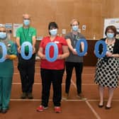 Half  millionth Covid vaccination in Lincolnshire. L-R Lynda Stockwell (clinical and operational lead), Dr Amira Ibrahim (on site GP), Alastair Cuthill (volunteer), Karen Hewinson (clinical lead), Harrison Bateman (volunteer), Rebecca Neno (deputy chief nurse LCCG)