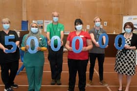 Half  millionth Covid vaccination in Lincolnshire. L-R Lynda Stockwell (clinical and operational lead), Dr Amira Ibrahim (on site GP), Alastair Cuthill (volunteer), Karen Hewinson (clinical lead), Harrison Bateman (volunteer), Rebecca Neno (deputy chief nurse LCCG)