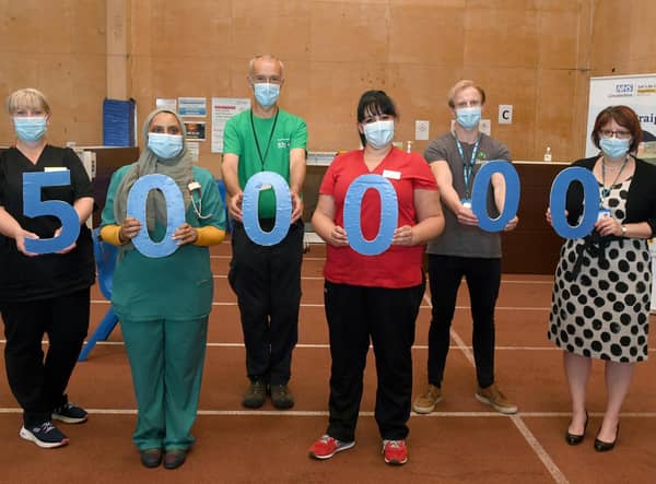 Half  millionth Covid vaccination in Lincolnshire. L-R Lynda Stockwell (clinical and operational lead), Dr Amira Ibrahim (on site GP), Alastair Cuthill (volunteer), Karen Hewinson (clinical lead), Harrison Bateman (volunteer), Rebecca Neno (deputy chief nurse LCCG)