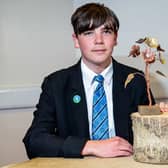 Year 10 student James Gilliatt with some of the metalwork sculptures he has created to put a smile on his mum’s face. (Photo: Jon Corken)