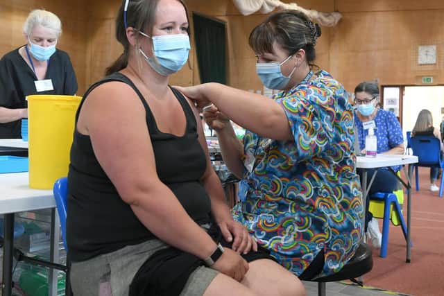 Ruth receives her vaccination