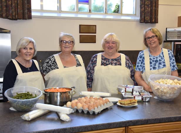 Norma Higton, second right, with, from left, Judy Dixon, Fiona Blackburn,  and Kath Edmondson,who worked every week for the past 15 months.Photo by John Edwards EMN-210614-152742001