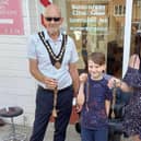 Finley is congratulated on his new haircut by the Mayor of Skegness Coun Trevor Burnham.