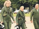 Brian May and Kerry Ellis with Group Captain Dave Waddington, station commander at RAF Cranwell.