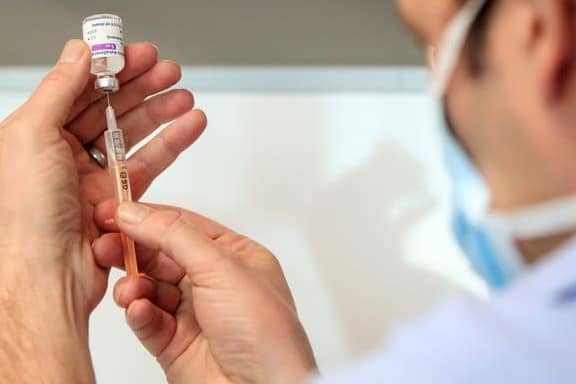 figures reveal around one in eight workers in North East Lincolnshire are yet to receive a jab.