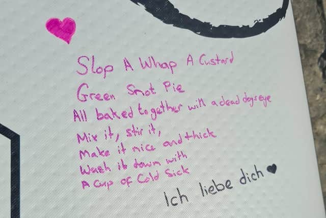 The messages on the board that will help Carolyn complete the challenge in memory of her dad.