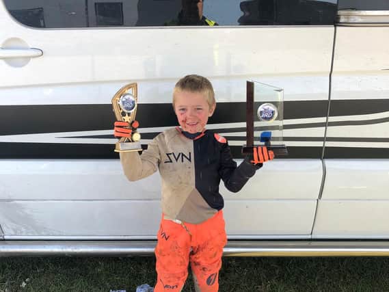 Jenson with one of his many trophies