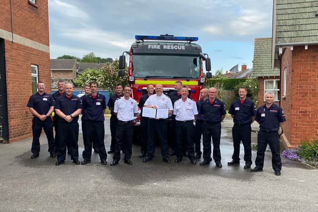DCC Lee Marsh receiving his long service certificate.