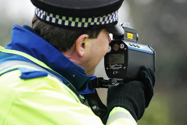 Police conducting speed tests. Library image.