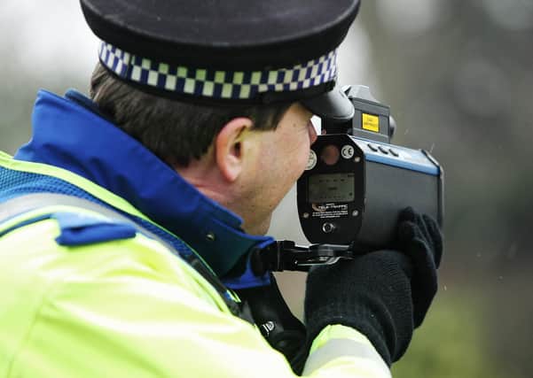 Police conducting speed tests. Library image.