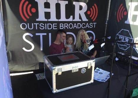 The HLR Outside Broadcast Studio, from left - Martin Davies, Mia, Diane Davies. EMN-210618-210759001