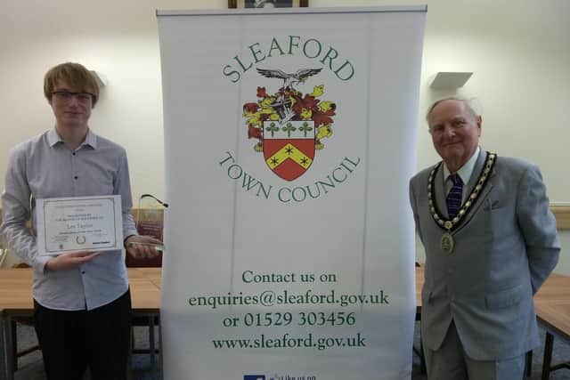Sleafordian of the Year 2020, Lee Taylor, battled to keep a post office in the town centre, with Mayor Tony Brand. EMN-210625-160540001
