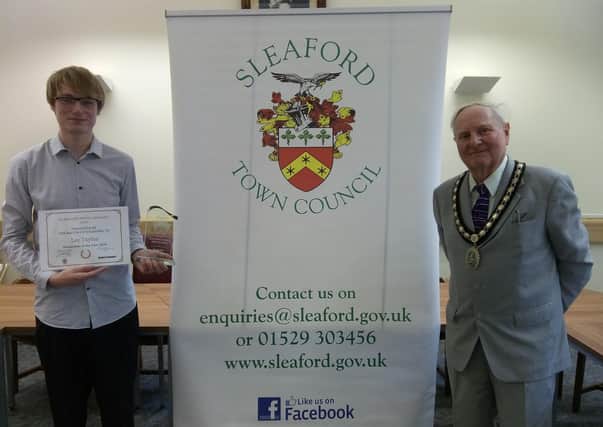 Sleafordian of the Year 2020, Lee  Taylor, battled to keep a post office in the town centre, with Mayor Tony Brand. EMN-210625-160540001