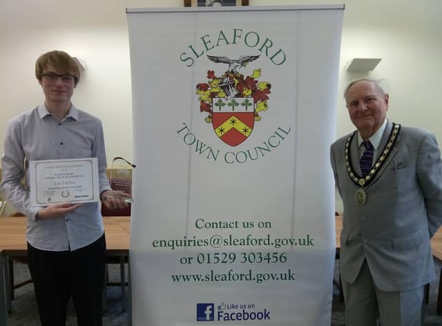 Sleafordian of the Year 2020, Lee  Taylor, battled to keep a post office in the town centre, with Mayor Tony Brand. EMN-210625-160540001