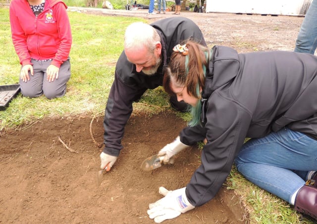 Digging on the site of the old driveway to the manor house. EMN-210628-181532001