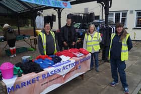 Members of Market Rasen Action group at the unifrom bank stall, which will return this weekend EMN-210622-084701001