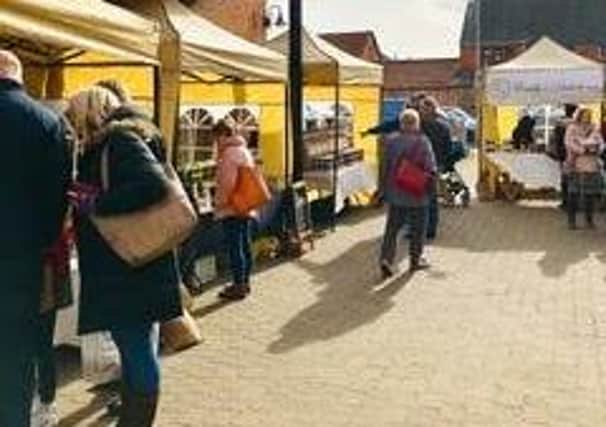 Stalls at a previous artisan market in Millstream Square, Sleaford. EMN-210622-163249001