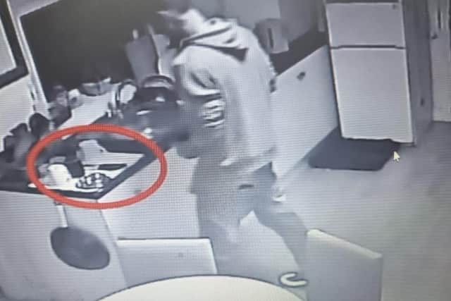 CCTV footage showing Paul Bodell arming himself with knife.