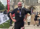 Mark Booth on completing the Race to the King on the South Downs Way. EMN-210625-142955001