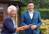 President Barbara Roberts welcomes new Rotary Club member Matt Waldeck. EMN-210625-151643001