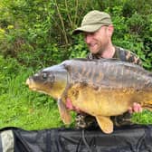 Dan Smith with a 40lb mirror carp.