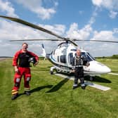 Paramedic Rob Filmer pilot Jim Lynch and Doctor Cosmo Scurr at Strubby Airfield.