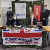 Re-signing the Armed Forces Covenant. Pictured in front are Elaine Baylis and Chief Executive, Andrew Morgan, with, across the back from left -  Lincolnshire Local Resilience Forum Military Liaison Officer, Major Mitch Pegg, RAF medic based at RAF Scampton, Sgt Sarah Holt, Advance Nurse Practitioner for Lincolnshire Community Health Services as well as Senior Nursing Officer in 212 Field Hospital Reservist Lieutenant Colonel Lindsay Baigent, and East Midlands Regional Employer Engagement Director at the Reserve Forces’ and Cadets’ Association, Bruce Spencer. EMN-210624-105313001