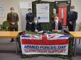 Re-signing the Armed Forces Covenant. Pictured in front are Elaine Baylis and Chief Executive, Andrew Morgan, with, across the back from left -  Lincolnshire Local Resilience Forum Military Liaison Officer, Major Mitch Pegg, RAF medic based at RAF Scampton, Sgt Sarah Holt, Advance Nurse Practitioner for Lincolnshire Community Health Services as well as Senior Nursing Officer in 212 Field Hospital Reservist Lieutenant Colonel Lindsay Baigent, and East Midlands Regional Employer Engagement Director at the Reserve Forces’ and Cadets’ Association, Bruce Spencer. EMN-210624-105313001