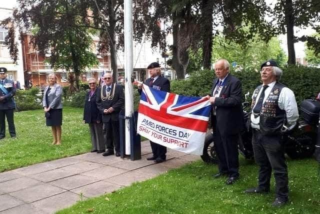 The mayor raises the Armed Forces Day flag