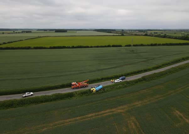 Surrounded by fields. The B1188 had to be closed for an hour or two yesterday afternoon (Thursday) to right an HGV tanker that had run off the road that morning. Photo: John Siddle EMN-210625-110136001