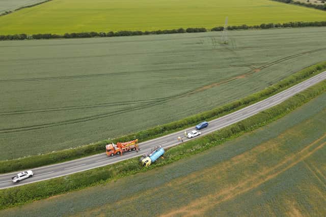 An overhead shot of the tanker lorry that ended up in a roadside ditch near Digby. Photo: John Siddle EMN-210625-110148001