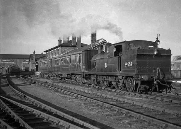 A former Great Central Railway A5 class locomotive, no. 69804, leaves Woodhall Spa for Horncastle, passing the location of the Woodhall Spa Cottage Museum along what is now the Spa Trail. Photo courtesy
of William Woolhouse Collection, Lincolnshire Coast Light Railway Historic Vehicles Trust. EMN-210625-135628001