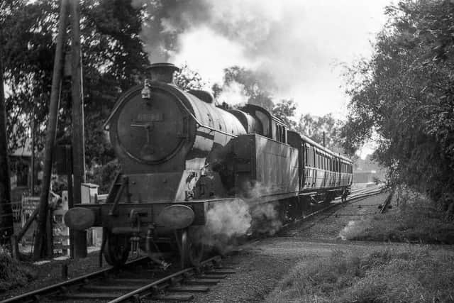Shortly before closure to passenger services, former Great Central Railway N5 class locomotive no. 69253, with the two veteran carriages converted from GNR “rail-motors” which were allocated to the Horncastle branch, prepares to set off from Horncastle with a train to Woodhall Spa and Woodhall Junction. Photo courtesy of William Woolhouse Collection, Lincolnshire Coast Light Railway Historic Vehicles Trust. EMN-210625-135650001