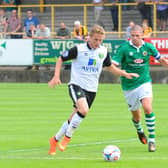 United defender Scott Garner in action against Norwich City the last time the two clubs met in a friendly, back in 2012.