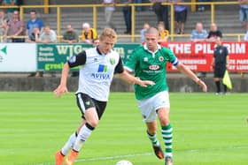United defender Scott Garner in action against Norwich City the last time the two clubs met in a friendly, back in 2012.