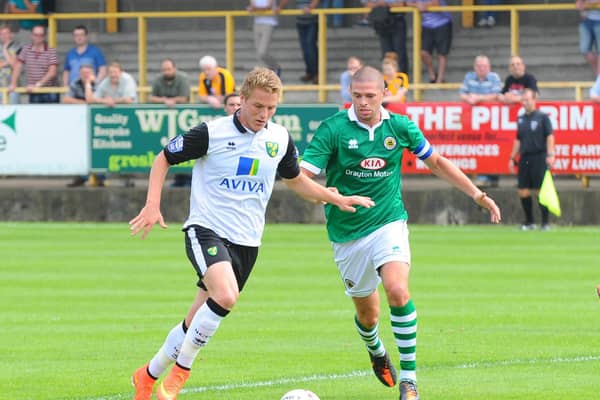 United defender Scott Garner in action against Norwich City the last time the two clubs met in a friendly, back in 2012.