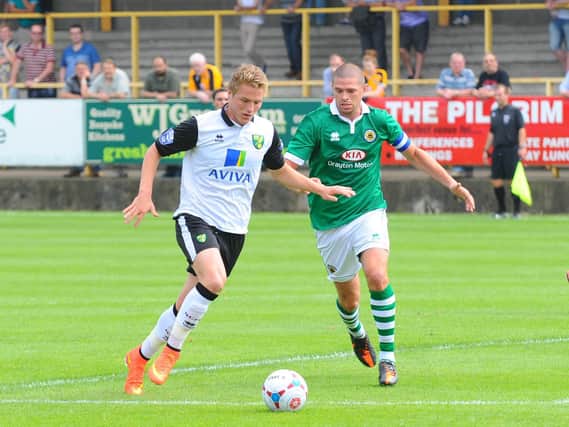 United defender Scott Garner in action against Norwich City the last time the two clubs met in a friendly, back in 2012.