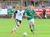 United defender Scott Garner in action against Norwich City the last time the two clubs met in a friendly, back in 2012.