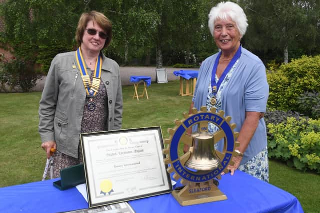 Barbara Roberts (right) handing over to Cath Hamblin as new president of the Rotary Club of Sleaford. EMN-210628-101855001