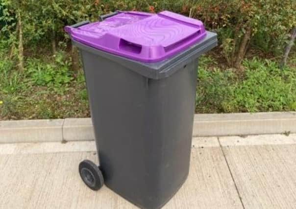 A purple-lidded bin like the ones that could be rolled out to all doorsteps in North Kesteven by September.