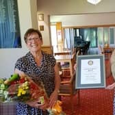 Eileen (left) receives her Community Service Award from the Rotary Club of Louth.