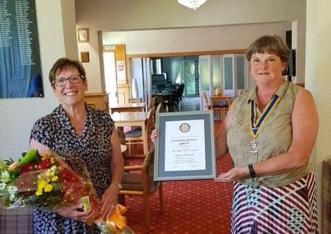 Eileen (left) receives her Community Service Award from the Rotary Club of Louth.
